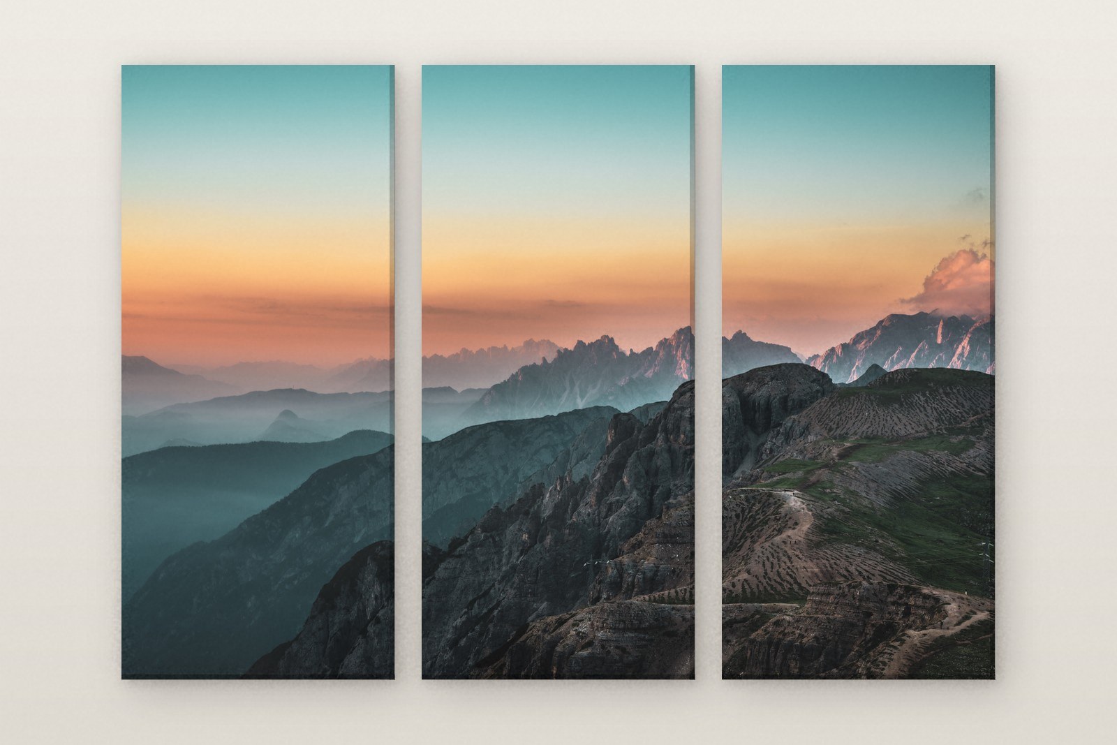 Spires in the Evening Haze, three panel set. The Cadini di Misurina layered in the orange haze of dusk. Photographed in Italy.